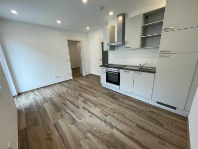 Geschmackvolle 2-Raum-Wohnung mit Garten und EBK in Kleinaitingen