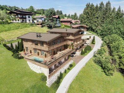 Zwei trendige Chalets mit endloser Aussicht