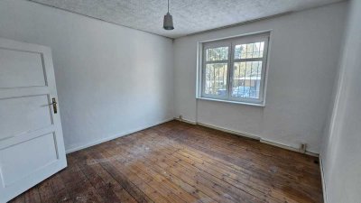 Wohnung mit Laden/Büro