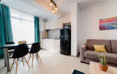 1,5-Zimmer-Wohnung mit möblierter Küche und sonnigem Balkon und herrlicher Aussicht!