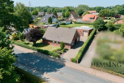 Familienfreundlich Einfamilienhaus mit Kamin, Glasfaser, Garage (E-Tor) & 2 Nebengebäuden – Büppel