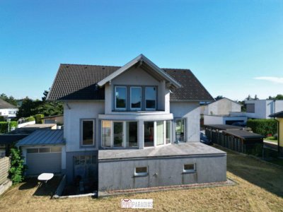 Einfamilienhaus mit außergewöhnlichem Potenzial auf großzügigem Eigengrund