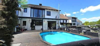 Ein-/Zweifamilienhaus ruhiger Lage mit Garten und Pool