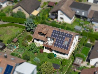 Wohnhaus mit drei Wohneinheiten, großem Garten und solider Ausstattung