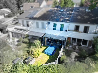 Familienidyll: Charmantes Reihenmittelhaus mit Südgarten und Sauna