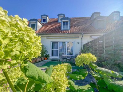 Lichtdurchflutete Maisonette-Wohnung mit kleinem Gartenanteil