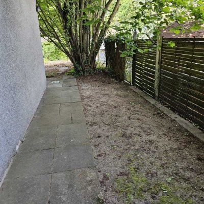 Gemütliche 2,5 Zimmer Wohnung mit Terrasse und Gartenanteil