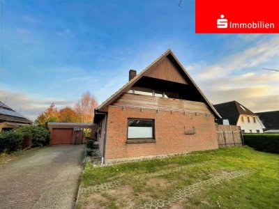 Traumhafte 4-Zi.-Whg. im EG eines ZFH mit Garage,PKW-Stellplatz und Garten