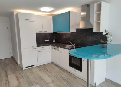 Schöne 2-Zimmer-Terrassenwohnung mit Wintergarten in ruhiger Lage