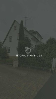 2-Familienhaus mit Baugrundstück & Gartenidylle – Viel Platz für Ihre Ideen!