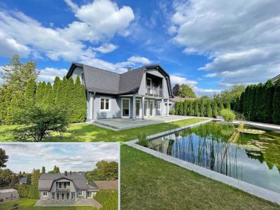 Wohnen auf 5 Sterne Niveau: Exzellentes Einfamilienhaus mit großem Naturteich und vielem mehr!