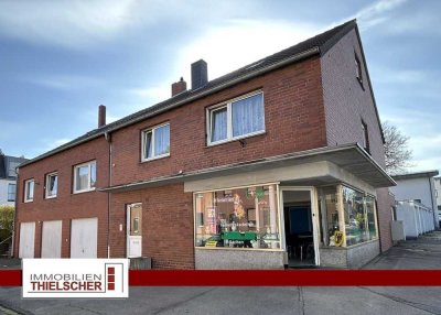 Doppelhaushälfte mit Gewerbeeinheit und 7 Garagen in Würselen