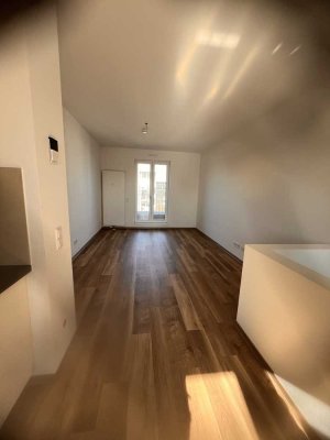 Wunderschöne 2 - Zimmer Maisonettewohnung im Neubau