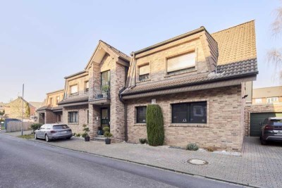 Helle Eigentumswohnung mit eigenem Garten und Garage in zentraler Ruhiglage von Gustorf