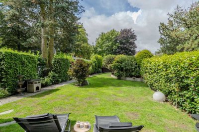 Wohnen mit Garten: Gepflegte Erdgeschosswohnung mit Privatoase in zentraler Lage