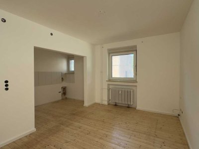 Renovierte 2,5-Zimmer Wohnung im EG mit Garten