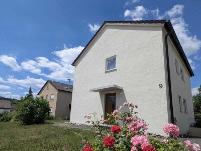 Gepflegtes Ein- bis Zweifamilienhaus  mit Pelletheizung, großem Garten  und Ausbaumöglichkeiten
