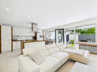 SCHICKE TERRASSENWOHNUNG MIT GARTEN, EINBAUKÜCHE UND TIEFGARAGENSTELLPLATZ