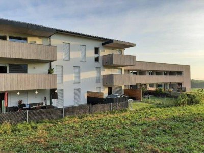Moderne 4 Zimmerwohnung mit Mietergarten und TG Platz