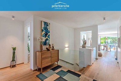 Waldperlach: Stylische 4,5-Zimmer-Maisonette-Gartenwohnung - Haus im Haus!