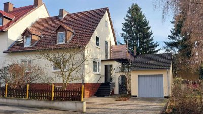 Zweifamilienhaus in Kassel-Niederzwehren mit Garten und Baugrundstück