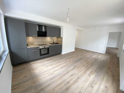 Helle, sanierte 2-Zi Whg, 2.OG, neuwertige EBK, Energieeffizienzhaus
