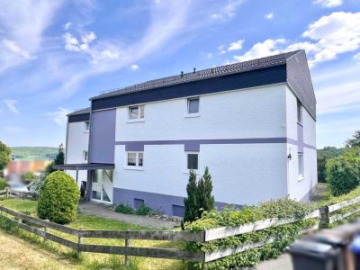 Schöne 3,5-Zimmer-Wohnung mit Balkon, Garage und Ausblick ins Grüne – Gepflegte Wohnanlage