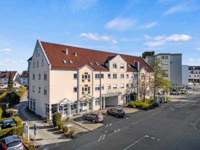 Charmante Etagenwohnung mit Aufzug, TG-Stellplatz und Balkon – zentral und ruhig gelegen