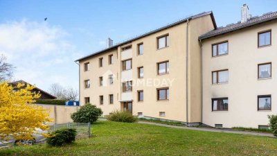 Gepflegte 1,5-Zimmer-DG-Wohnung in ruhiger Lage mit Tageslichtbad, Weitblick & ca. 4 % Rendite