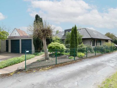 Vielseitige Traumimmobilie - Zweifamilienhaus mit Erdwärme 
und idyllischem Gartenparadies in Löhne