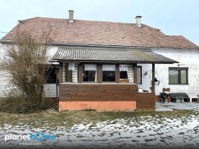 Haus mit Entwicklungspotenzial auf großzügigem Grundstück in Top Lage