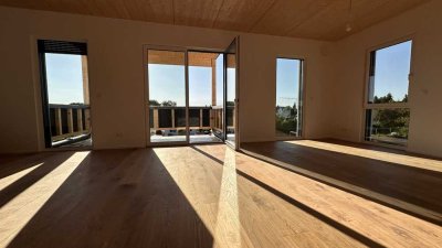 KfW 40 EE | Vermietet | Biobau | 5% AfA | Exklusive 4Z. Wohnung mit Balkon & Panoramablick +++
