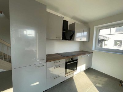 Erstbezug mit EBK: Stilvolle 3-Zimmer-Erdgeschosswohnung mit geh. Innenausstattung