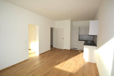 Wohnen am Andreas-Hofer-Platz – Erstklassig sanierte Wohnung mit zwei Balkonen