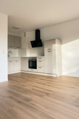 Frisch sanierte 2-Zimmer-Wohnung mit großzügiger Dachterrasse im Zentrum von Rissen