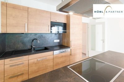 2 Zimmer Wohnung mit Balkon, Einbauküche und Fußbodenheizung | elektrische Außenbeschattung