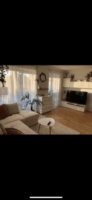 2 Zimmer Wohnung mit Garten und TG-Parkplatz