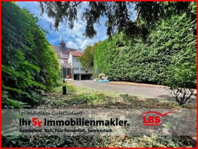 Ein-/Zweifamilienhaus mit Gewerbe in zentraler Lage