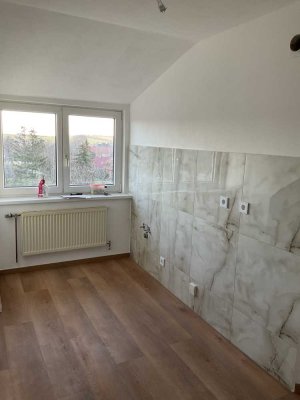 Schöne 2 Zimmer Dachgeschosswohnung mit Blick auf den Harz