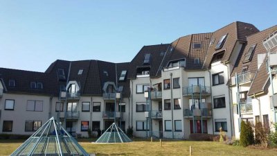 Helle 2 Zimmer-Single-Wohnung (teilmöbliert) mit Einbauküche und Tiefgaragenstellplatz