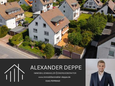 Solides Mehrfamilienhaus mit drei Wohnungen, drei Garagen und jeder Menge Potenzial!