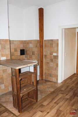 Individuell geschnittene Wohnung mit Balkon