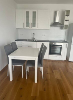 Traumhafte neuwertige 2-Zimmer-Wohnung mit großem Balkon in erstklassiger Lage!