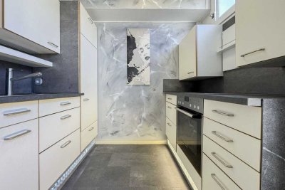 Renovierte 1-Zimmer-Wohnung mit Tiefgaragenstellplatz in gut angebundener Lage