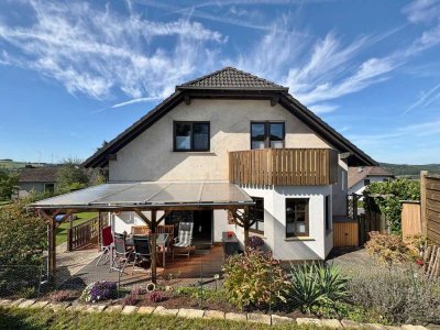 **Familienfreundliches Haus mit schönem Garten, Terrasse und Weitblick**