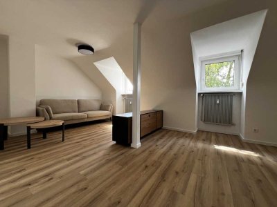 Exklusive und moderne Dachgeschosswohnung – Erstbezug & mit neuer Einbauküche