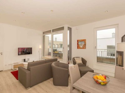 Lichterfüllte Ferienwohnung mit Panorama-Dachterrasse und Strandflair