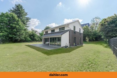 Neubau mit Stil: Effizientes Einfamilienhaus mit Wärmepumpe und Doppelgarage im Grünen