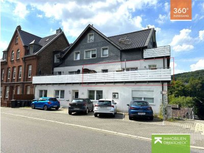 Vermietete Etagenwohnung mit großer Terrasse und Außenstellplatz