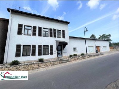 GRENZE L-REMICH: WOHNHAUS MIT 3 WOHNUNGEN, GARAGEN UND GARTEN